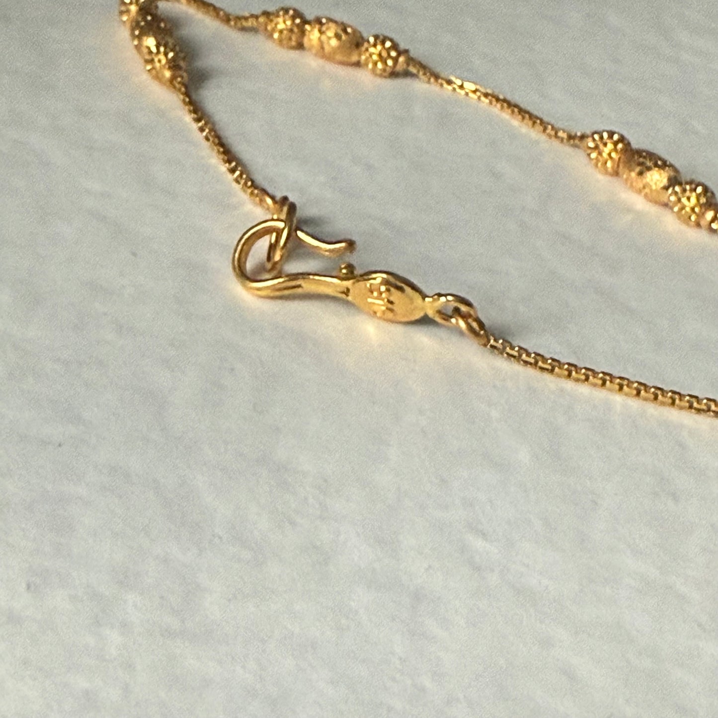 22ct gold triple beaded l 7 inches