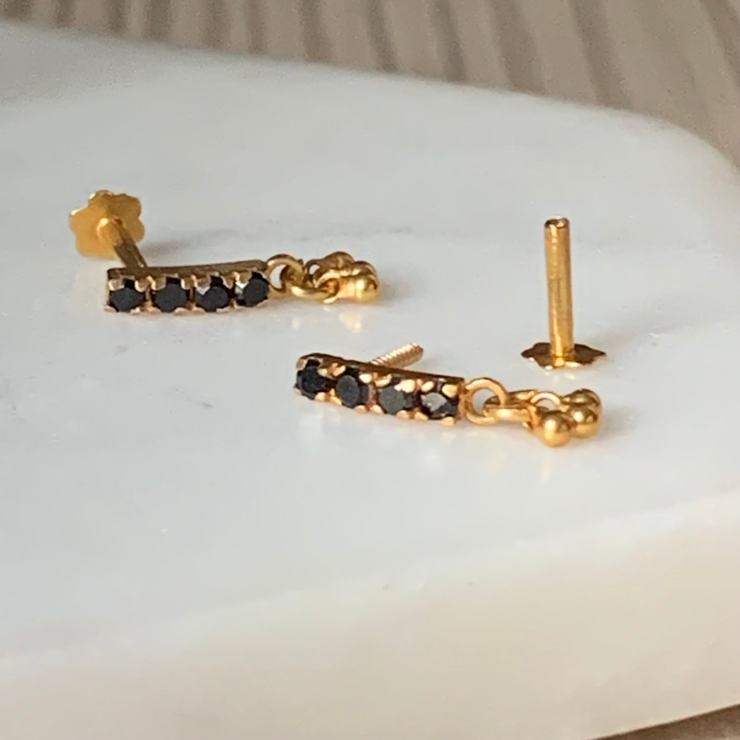 18ct Gold Dangly Studs | black c/z stones