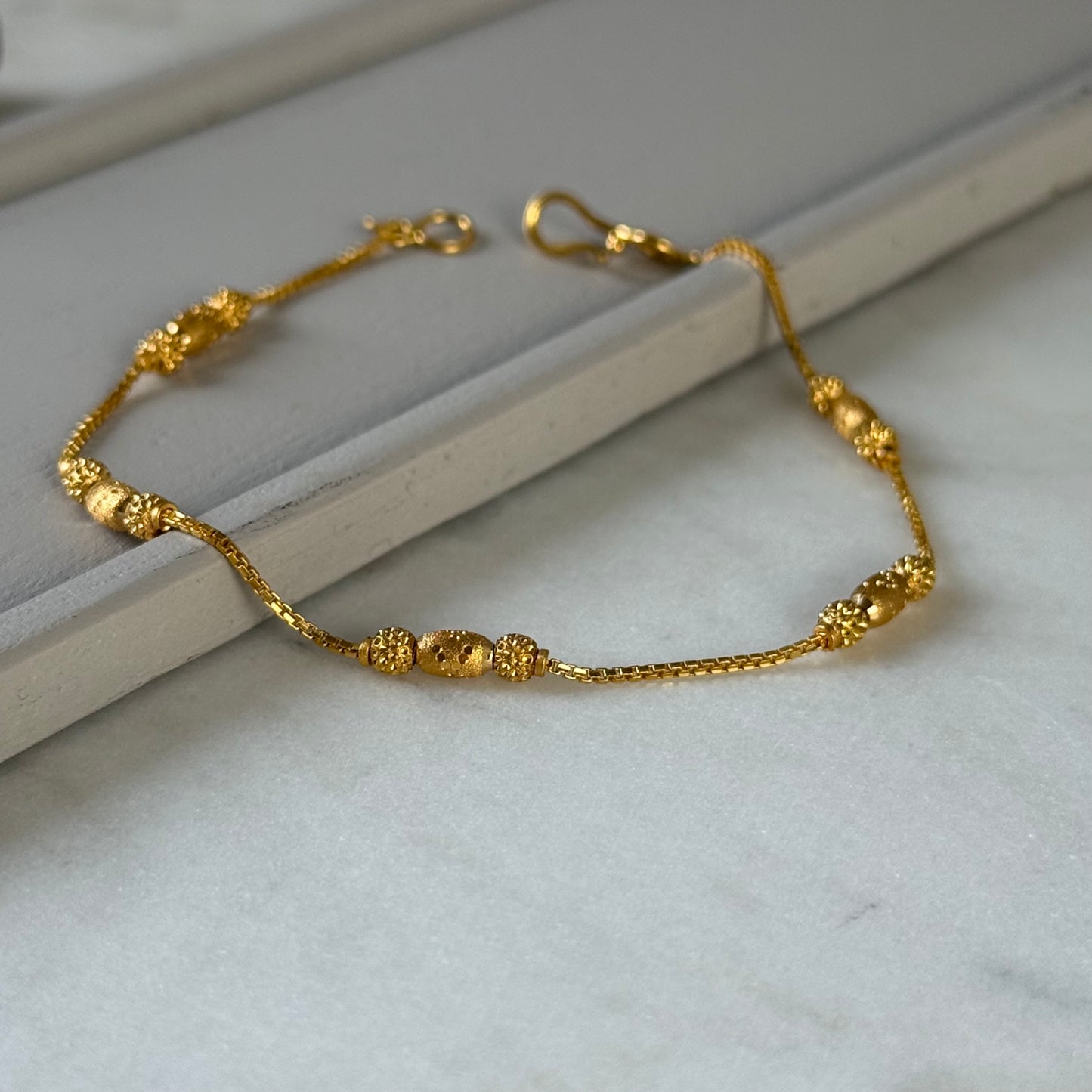 22ct gold triple beaded l 7 inches