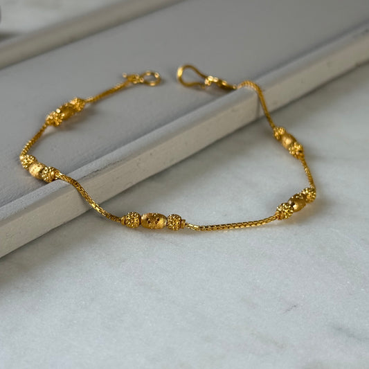 22ct gold triple beaded l 7 inches