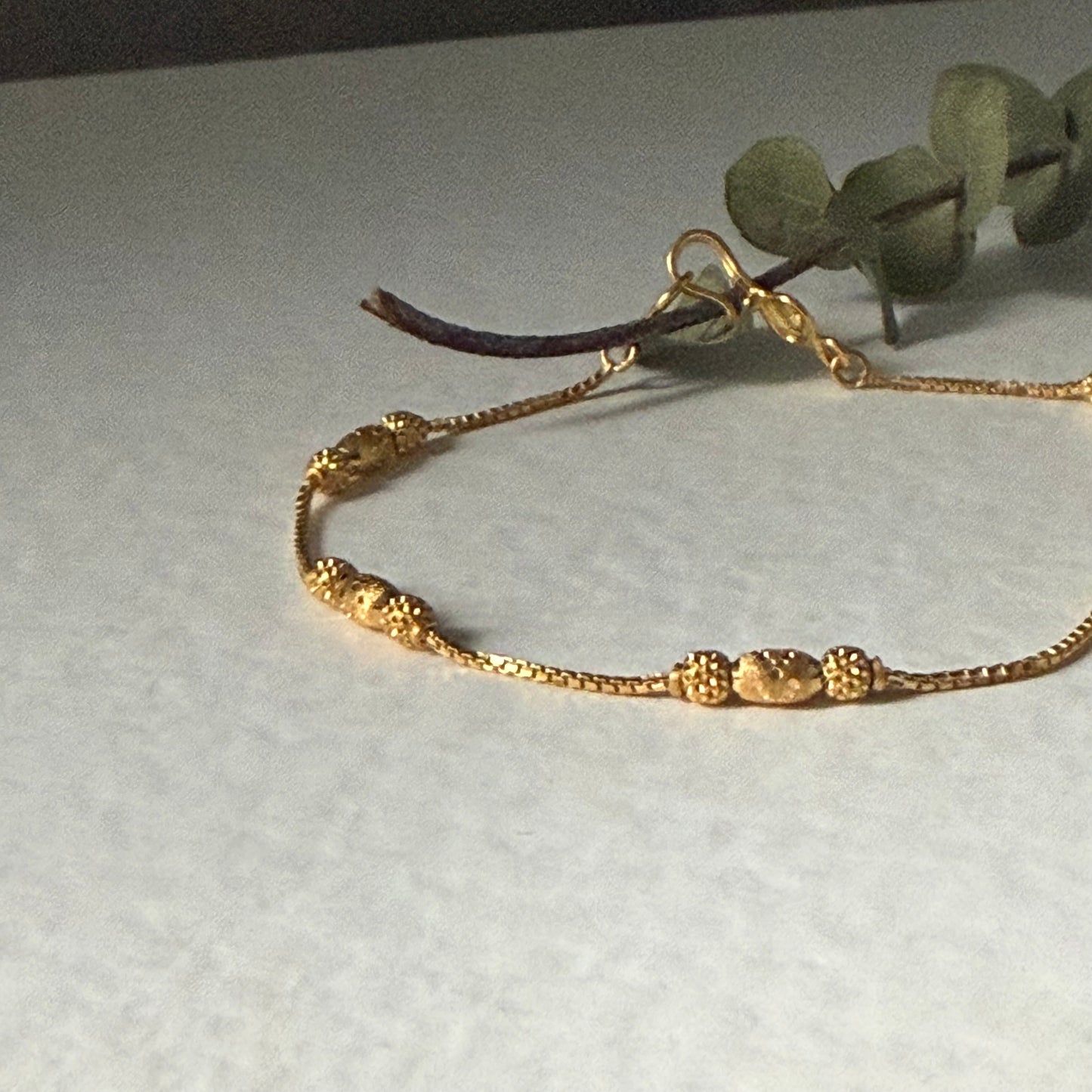 22ct gold triple beaded l 7 inches