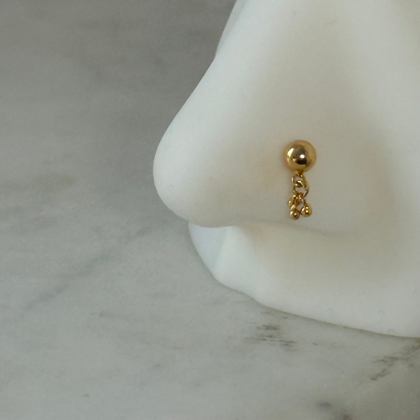 18ct gold dangly stud