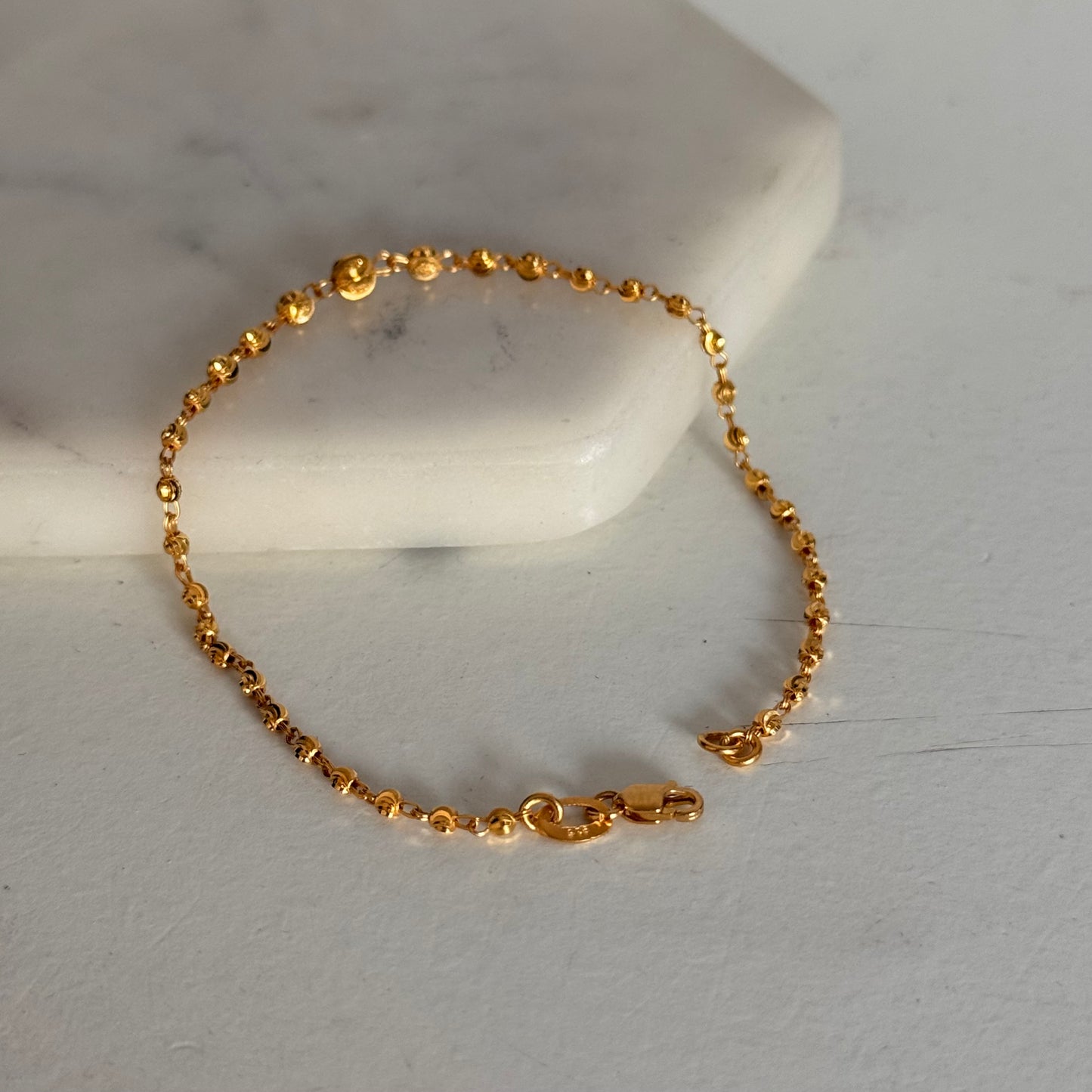 Alaia, 22ct beaded bracelet