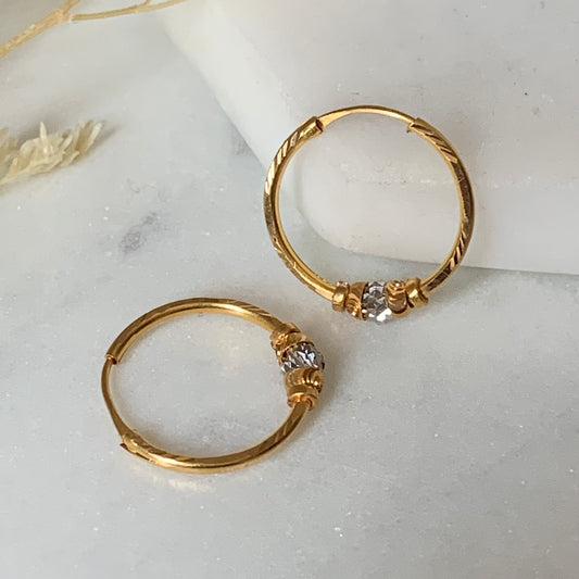 18 carat gold hoop pair (Rhodium)