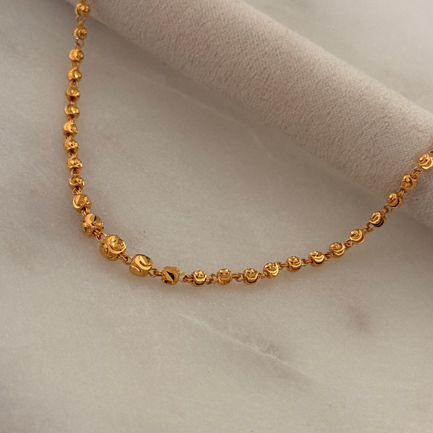 Rumaisah | 22ct gold beaded bracelet