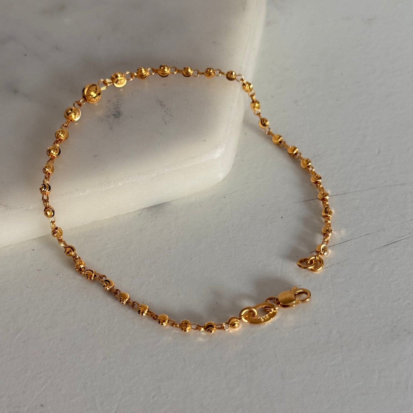 Alaia, 22ct beaded bracelet