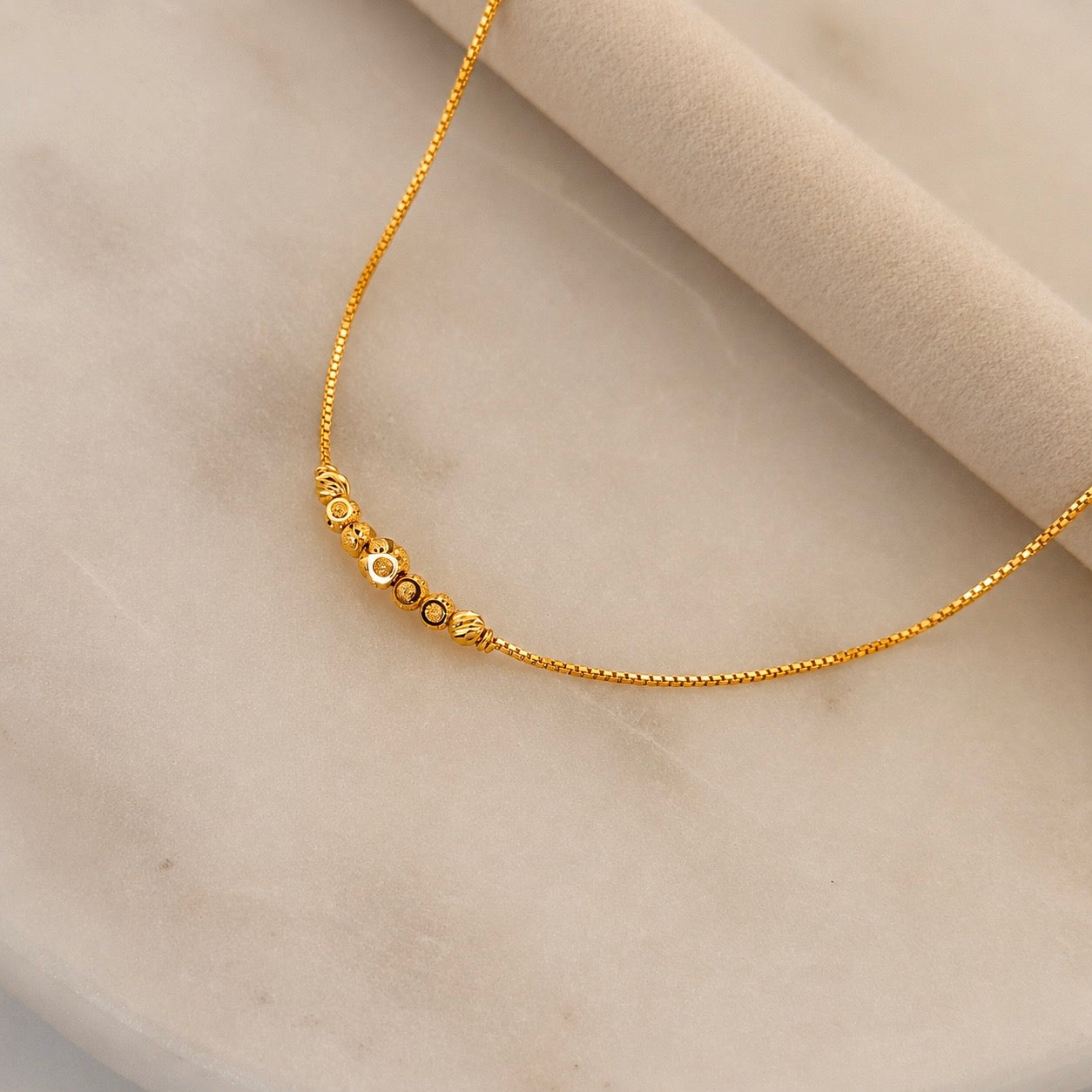 Aasiyah | 22ct gold minimal beaded bracelet