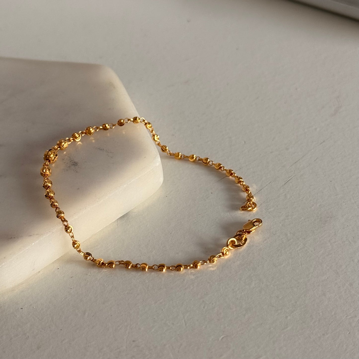Alaia, 22ct beaded bracelet