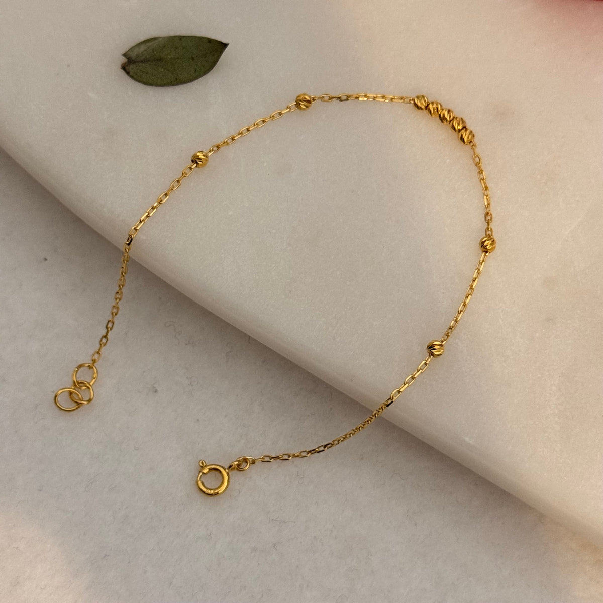 Minimal 22ct gold beaded bracelet