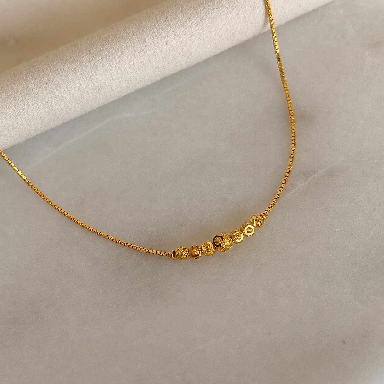 Aasiyah | 22ct gold minimal beaded bracelet
