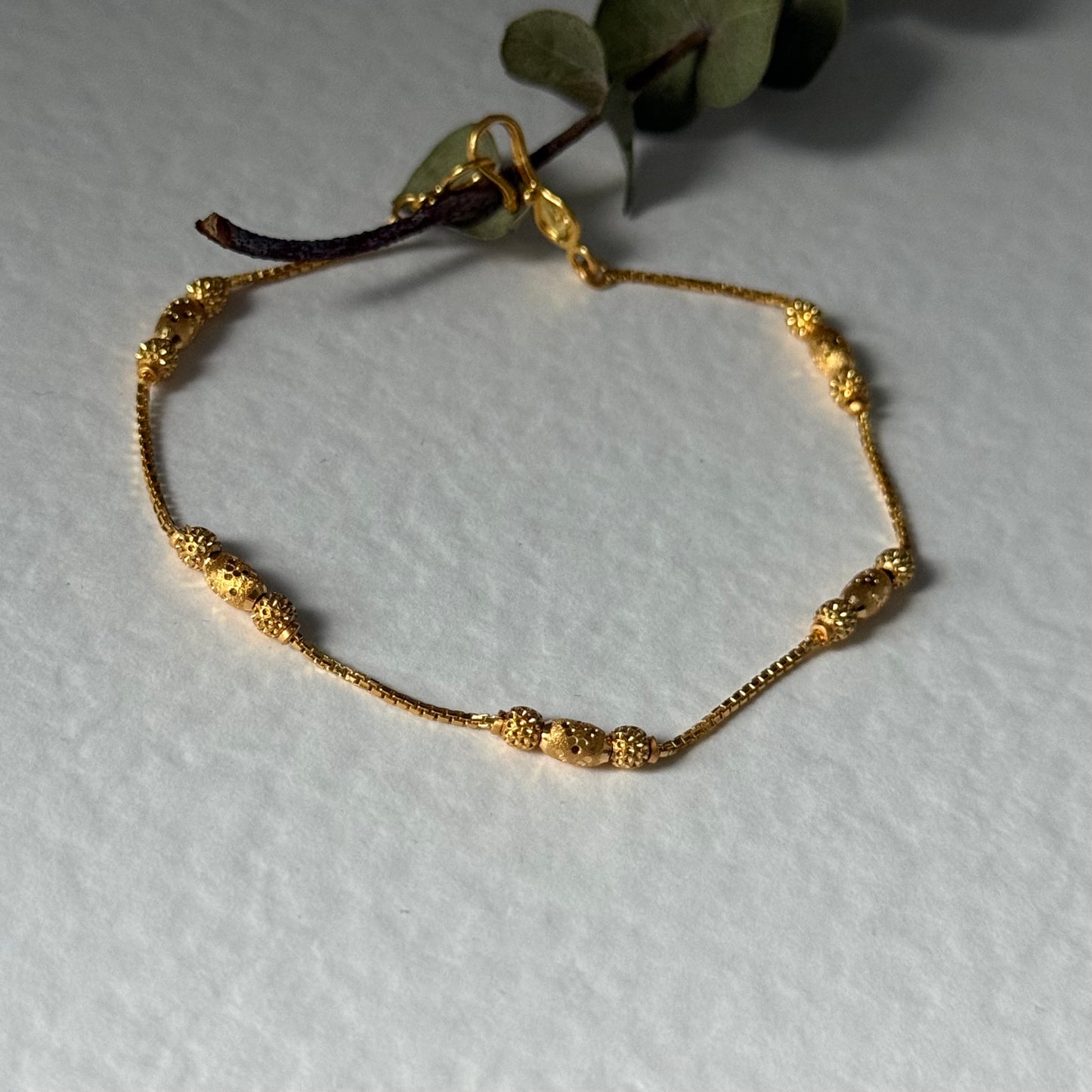 22ct gold triple beaded l 7 inches