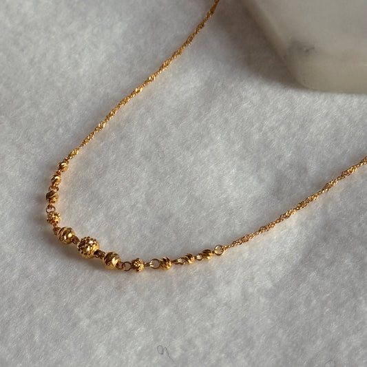Morris, 22ct gold beaded necklace