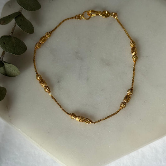 22ct gold triple beaded l 7 inches