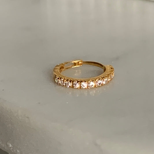 18k gold hoop encrusted with cubic zirconia stones